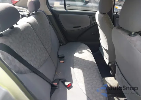 2000 Toyota Echo z USA, uszkodzony, nr VIN JTDBT1238Y0050024